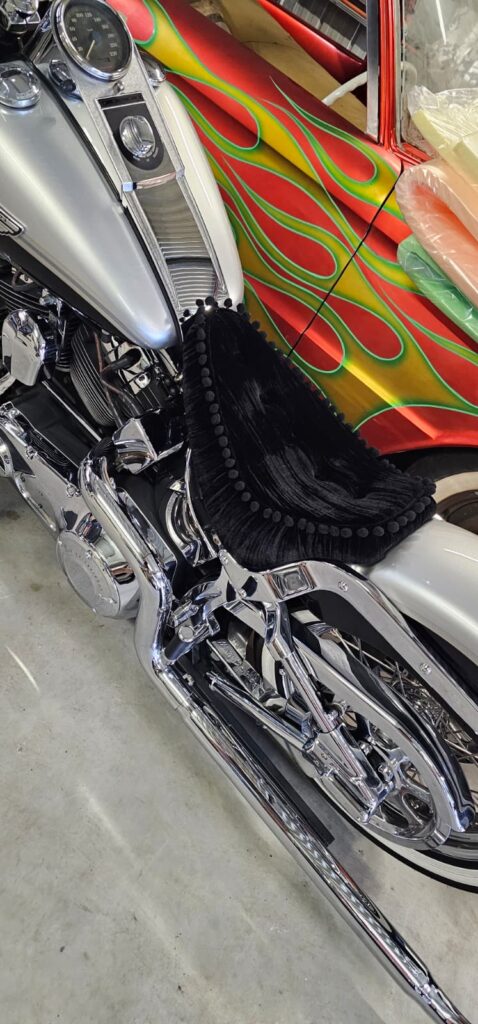 Motorcycle seat recovering